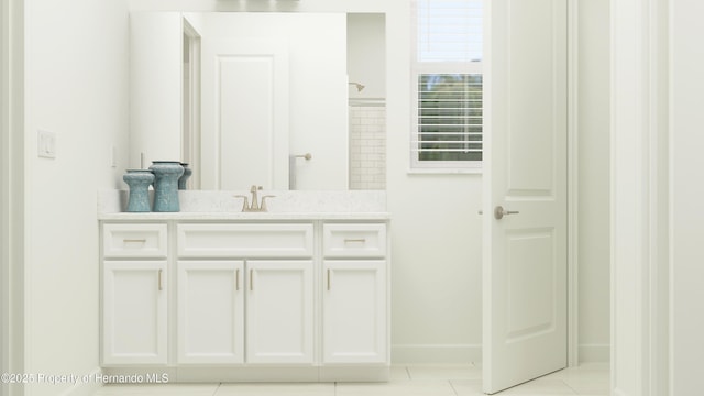 bathroom with vanity and walk in shower