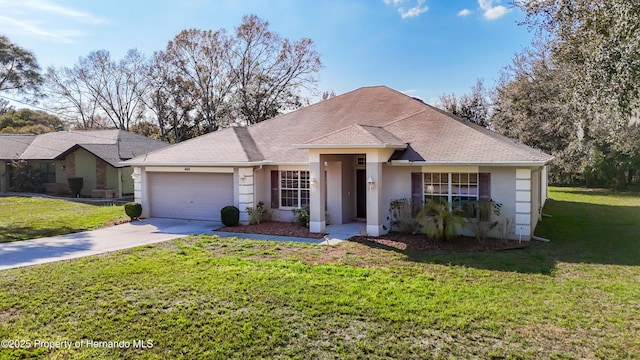 single story home with a front lawn and a garage