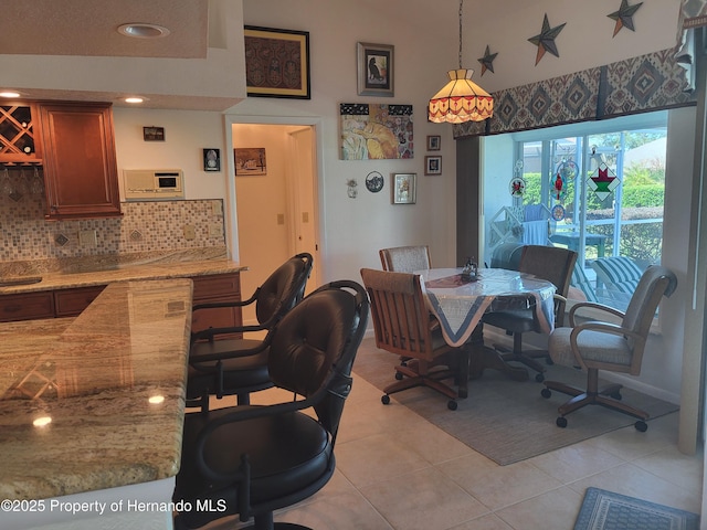 dining room with light tile patterned floors