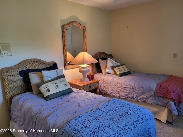 bedroom featuring carpet