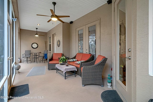 view of patio featuring ceiling fan and outdoor lounge area