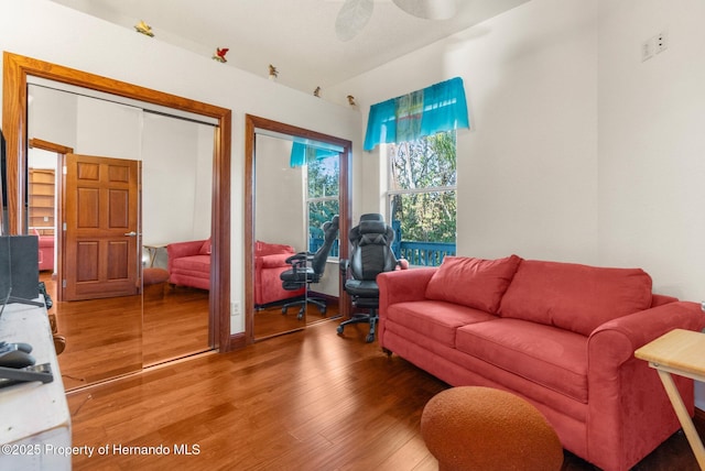 living room with wood finished floors