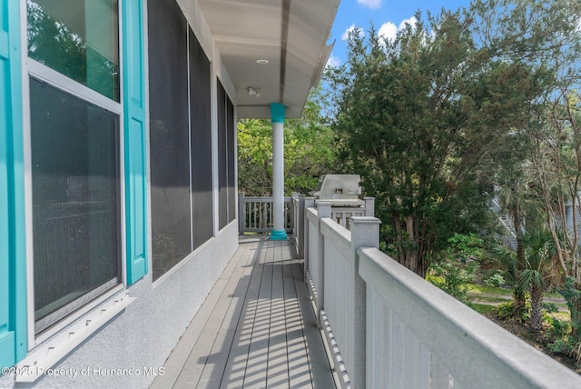 balcony featuring area for grilling