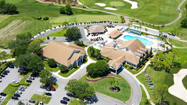 birds eye view of property featuring view of golf course