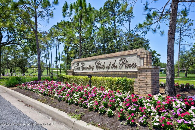 view of community sign