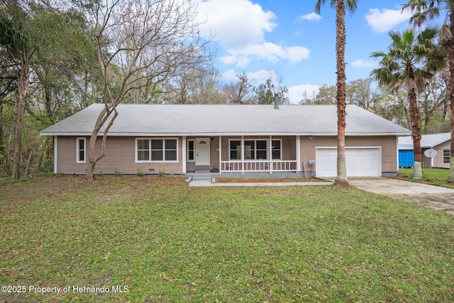 single story home featuring a garage, covered porch, driveway, and a front lawn