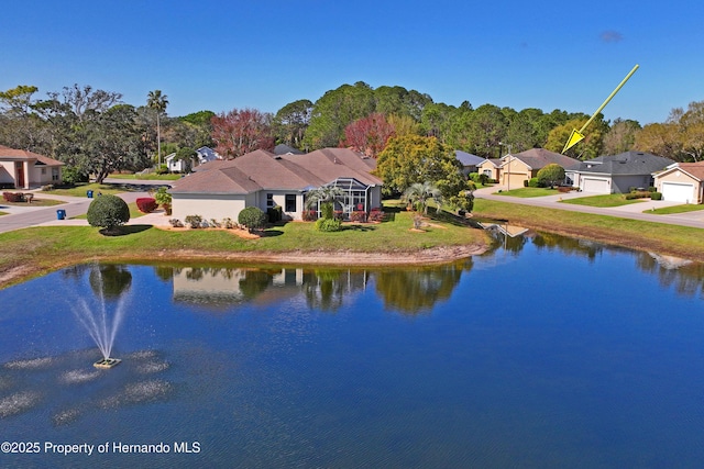 exterior space with a water view