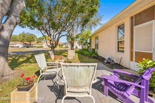 view of patio / terrace with a residential view