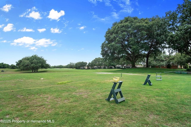 surrounding community with a yard