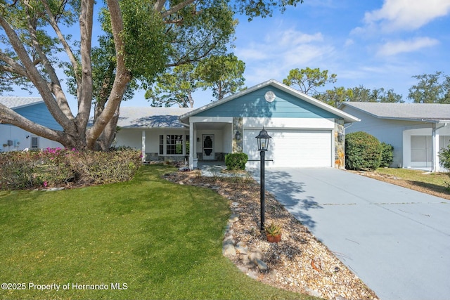 single story home with a garage, concrete driveway, and a front lawn