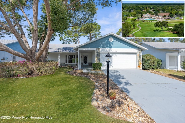 ranch-style house with a garage, driveway, and a front lawn