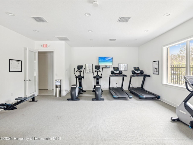 gym with recessed lighting and visible vents