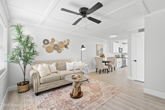 living room with light wood-type flooring, baseboards, visible vents, and coffered ceiling