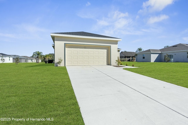 garage featuring driveway and a residential view