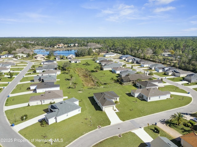 birds eye view of property featuring a residential view and a water view