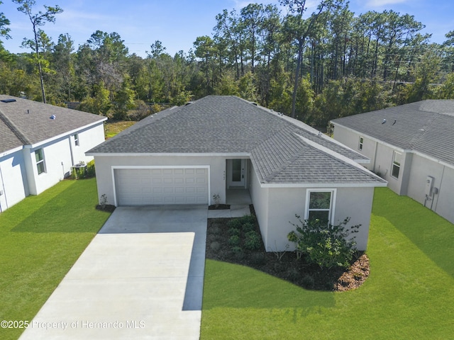 ranch-style house with stucco siding, a shingled roof, concrete driveway, an attached garage, and a front yard