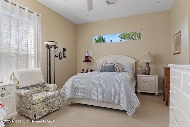 bedroom with ceiling fan and carpet flooring