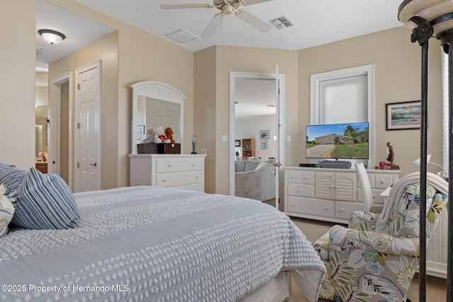 bedroom featuring visible vents and ceiling fan