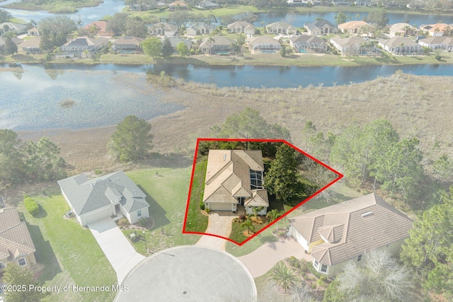 aerial view featuring a residential view and a water view