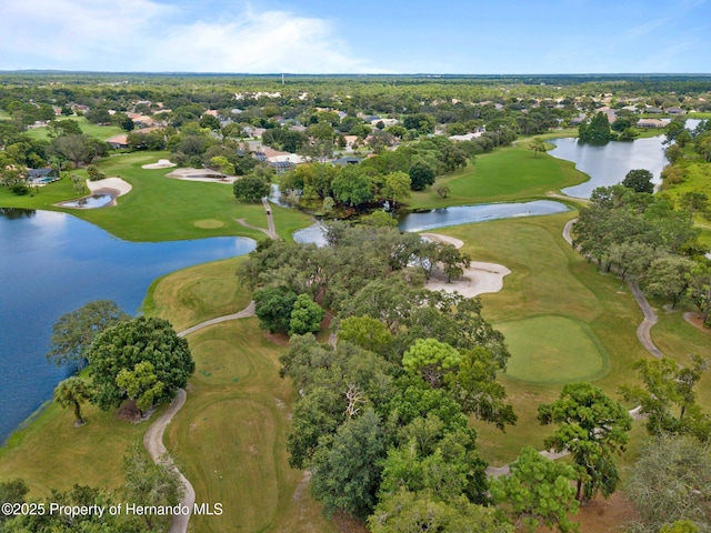 birds eye view of property featuring a water view and golf course view