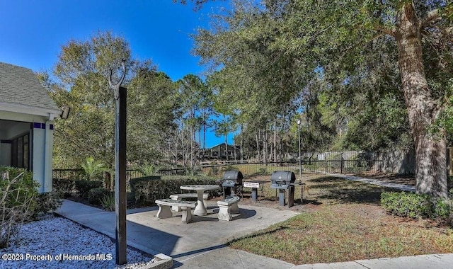 view of patio / terrace featuring fence and area for grilling