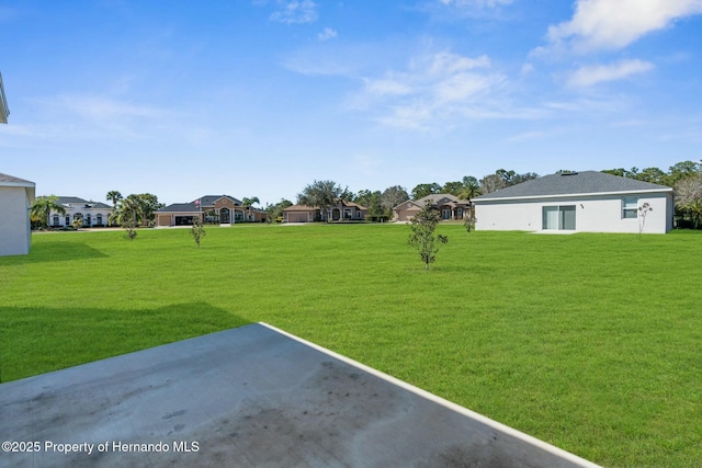 view of yard with a residential view