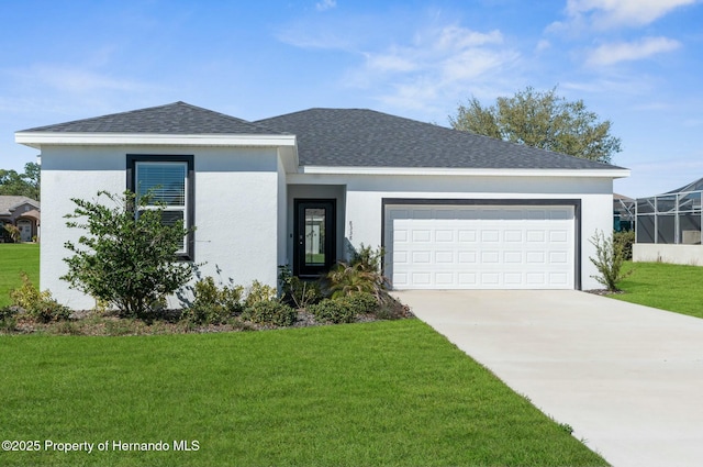 single story home featuring an attached garage, concrete driveway, roof with shingles, stucco siding, and a front yard