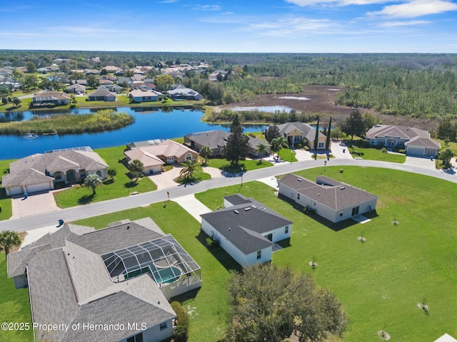 bird's eye view with a water view and a residential view