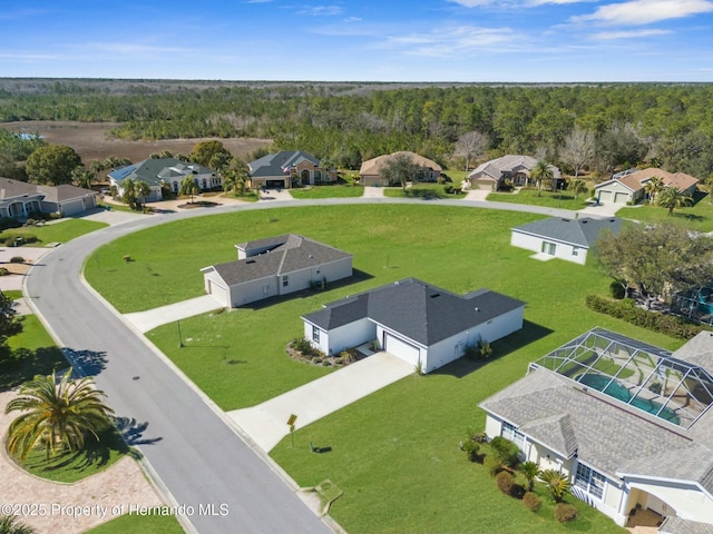 aerial view with a residential view and a forest view