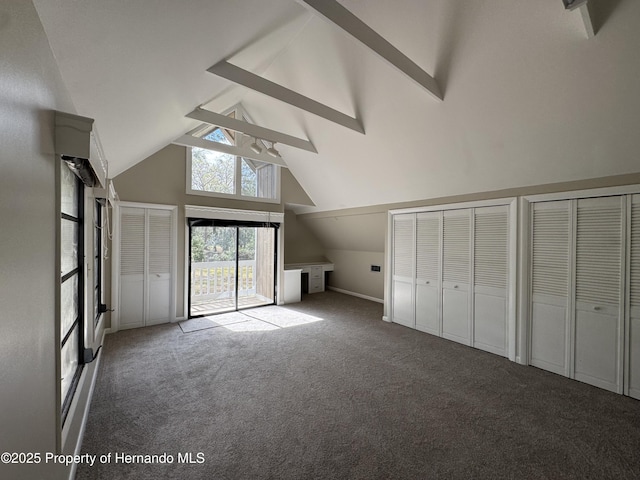 additional living space featuring high vaulted ceiling, carpet flooring, and beam ceiling