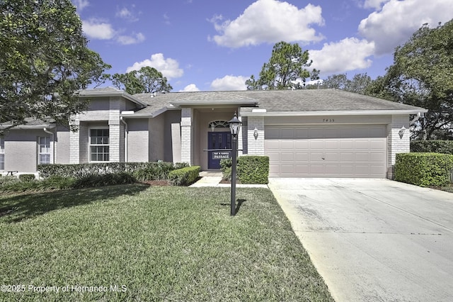 view of front of house with brick siding, a shingled roof, concrete driveway, a garage, and a front lawn