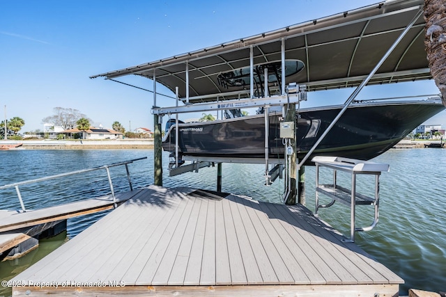 dock area featuring a water view and boat lift