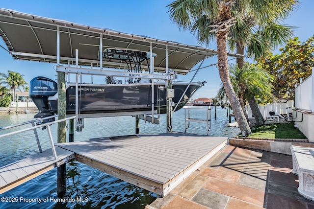 view of dock featuring a water view and boat lift