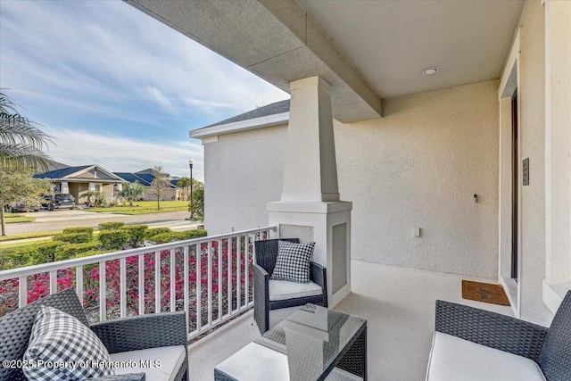 balcony featuring a residential view