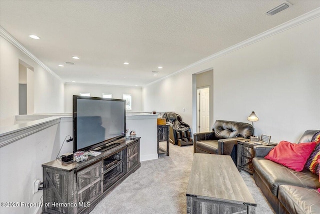 living area featuring visible vents, recessed lighting, a textured ceiling, crown molding, and light carpet