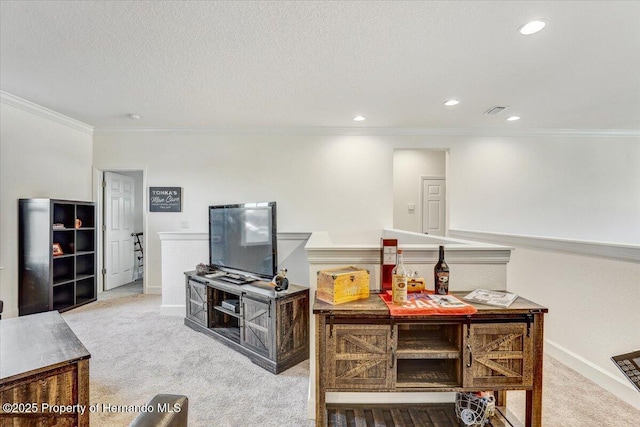 living area featuring crown molding, recessed lighting, carpet, and a textured ceiling