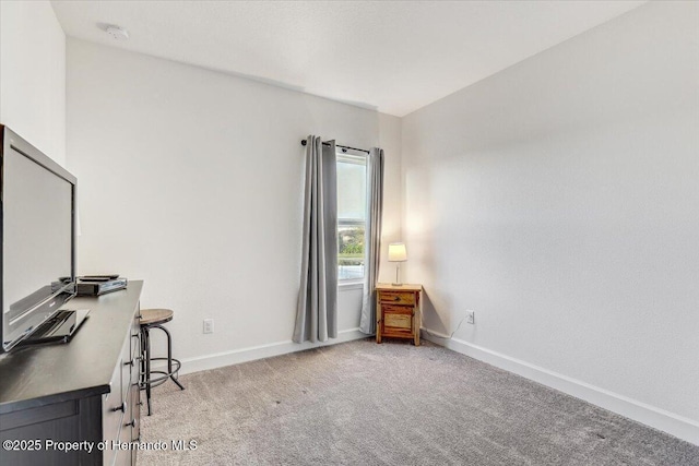 office area with carpet flooring and baseboards