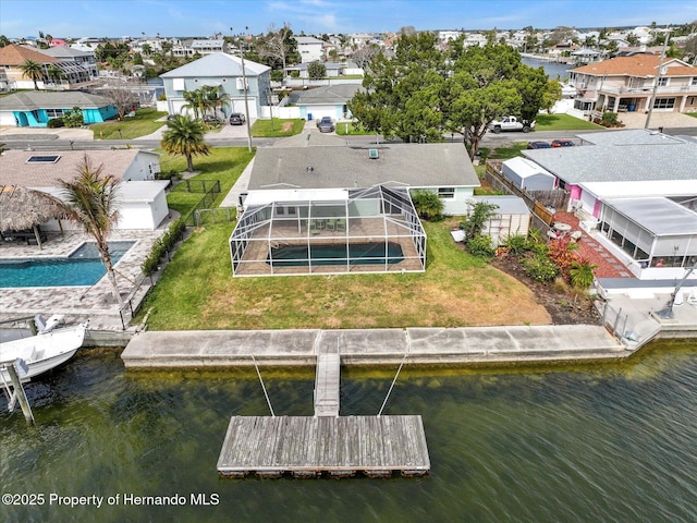 aerial view featuring a residential view and a water view