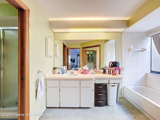 ensuite bathroom featuring a garden tub, ensuite bath, and a shower stall