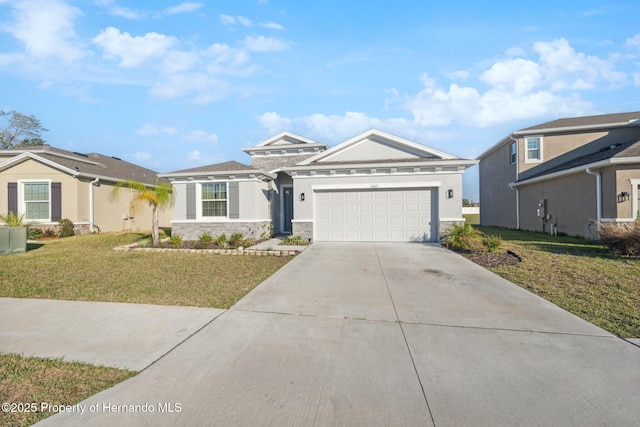 view of front of home featuring stucco siding, an attached garage, a front yard, stone siding, and driveway