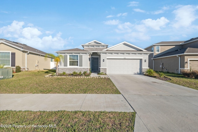 view of front facade featuring stucco siding, concrete driveway, an attached garage, a front yard, and stone siding