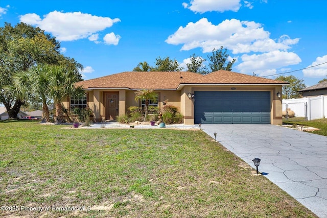 single story home with stucco siding, driveway, fence, a front yard, and an attached garage