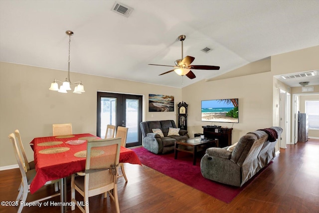 living area featuring visible vents, dark wood-type flooring, and french doors