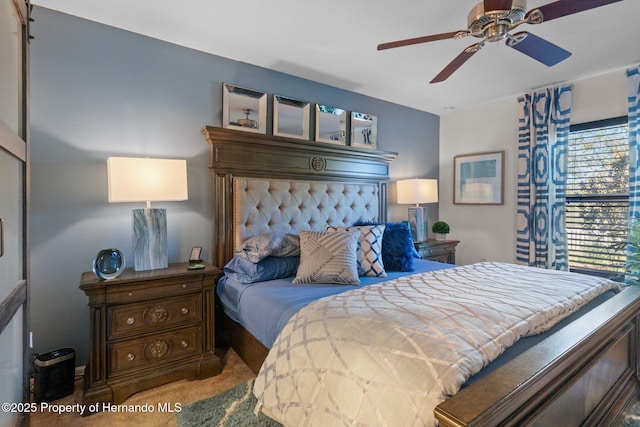 bedroom with carpet floors and a ceiling fan