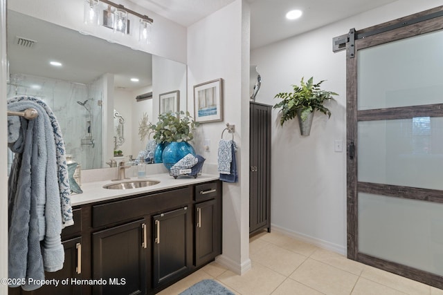 full bath featuring visible vents, tile patterned flooring, walk in shower, vanity, and recessed lighting