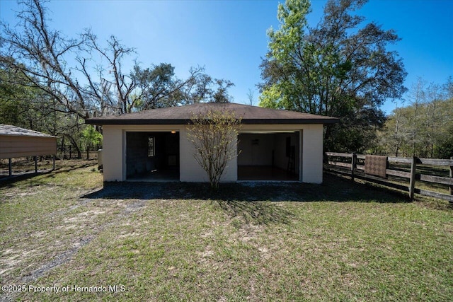 detached garage with fence