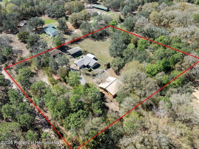 birds eye view of property featuring a rural view