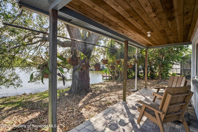 view of patio / terrace featuring a water view