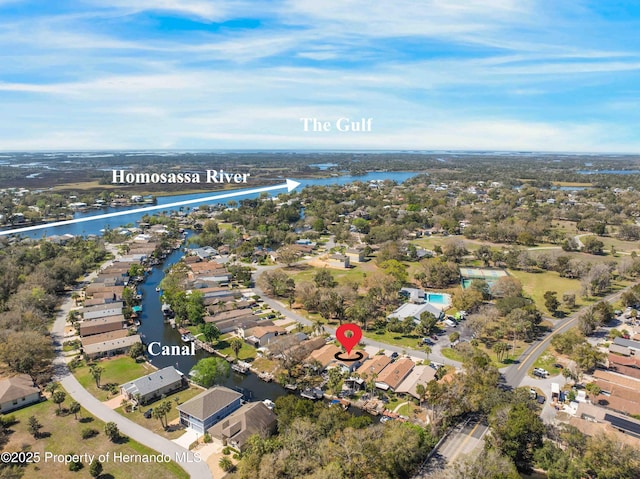 birds eye view of property featuring a water view and a residential view