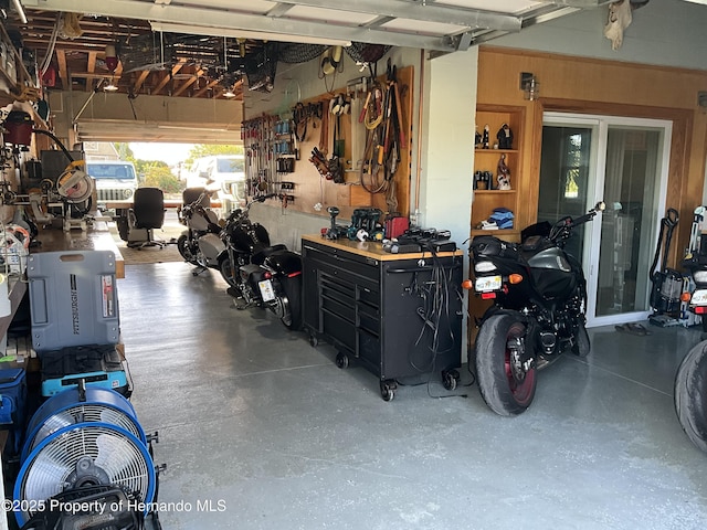 garage with a workshop area